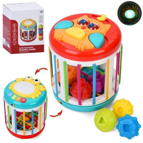 Игра Цилиндр, 18*13,5*13,5см, грани-резинки, часы, фигурки 6шт, барабан, пианино, музыка,звук,свет, рег.громкости, подвижные детали, на батар., в кор. 14*19,5*14см 